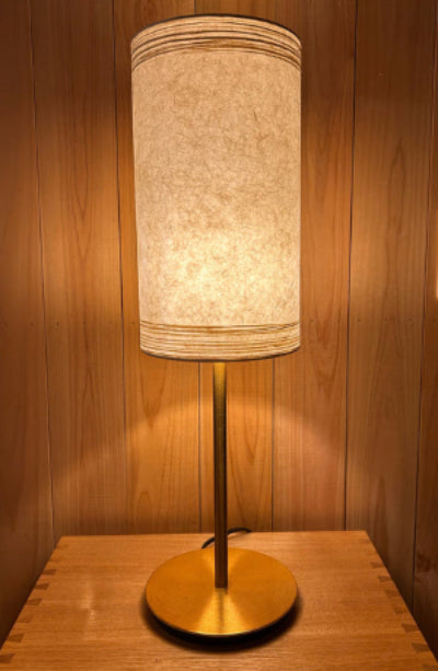 Handmade washi japanese paper lampshade creates a warm and tranquil glow.