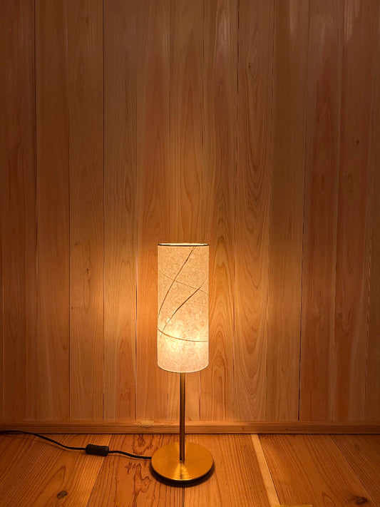 Table lamp with a washi shade creates a warm glow