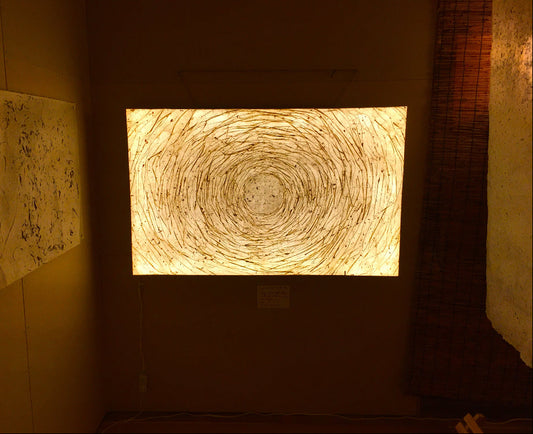 Circular pattern on a wall with warm lighting