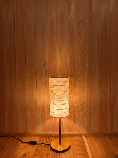 table lamp with washi lampshade creates a warm and tranquil glow.