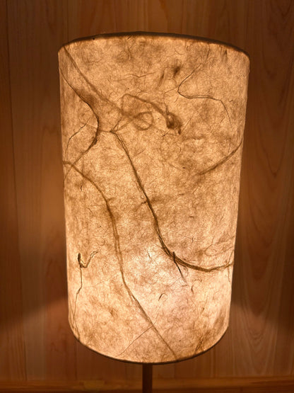 Decorative washi lamp with marble design on a wooden surface