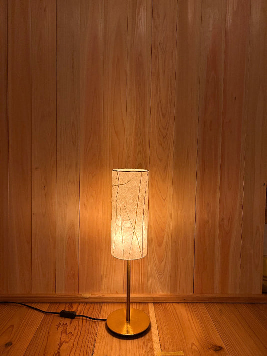 washi table lamp creates a soft, warm glow